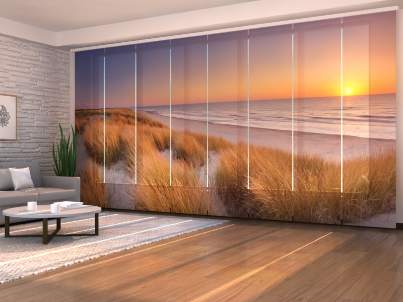 Schiebegardinen Dünen und Strand bei Sonnenuntergang in den Niederlanden